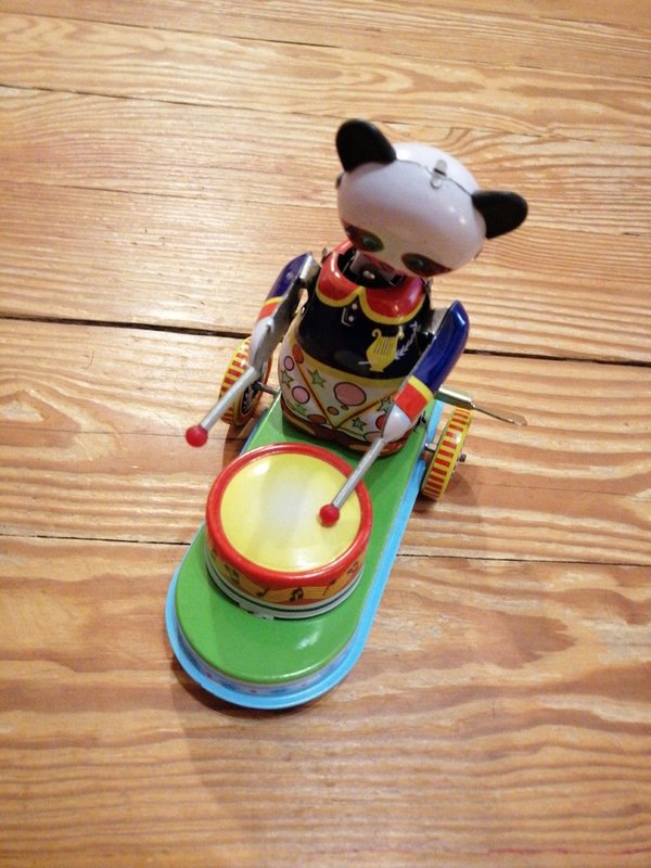 Blechspielzeug "rollender Panda"